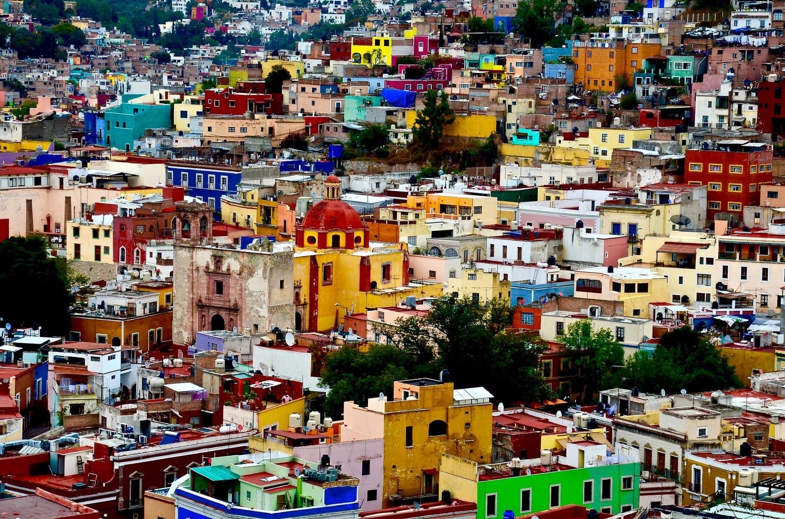 Colorful houses stacked on the hillsides of Guanajuato